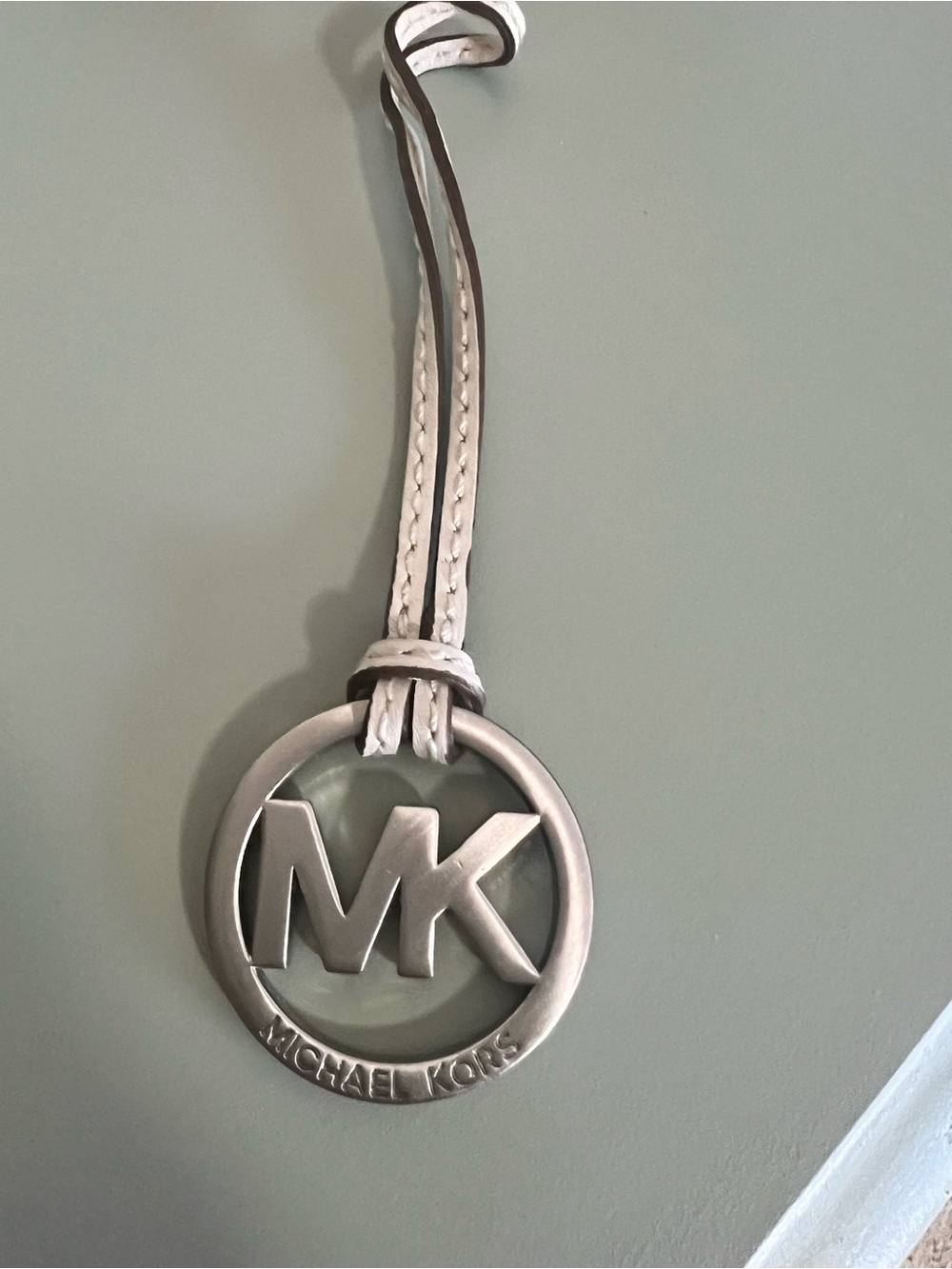 Michael Kors Silver hang tag bag charm